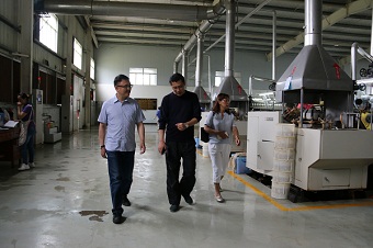  民建普洱市委调研招商引资落地企业发展情况